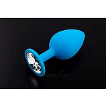 <strong>Большая голубая силиконовая пробка с прозрачным кристаллом - 9 см.</strong> <br />
Стильная, модная, шелковистая на ощупь, очень качественная и соблазнительно недорогая анальная пробка лилового цвета, украшенная кристаллом. <div class="charTableblock"><div><span>Длина, см</span>: 9</div><div><span>Диаметр, см</span>: 4</div><div><span>Материал</span>: силикон</div><div><span>Цвет</span>: другой</div><div><span>Особенности</span>: пробка; ювелирка</div><div><span>Особенности</span>: без вибрации; гладкая</div><div><span>Длина, см</span>: 9-12</div><div><span>Диаметр, см</span>: 4</div><div><span>Цвет кристалла</span>: прозрачный</div></div> Большая голубая силиконовая пробка с прозрачным кристаллом - 9 см.
Стильная, модная, шелковистая на ощупь, очень качественная и соблазнительно недорогая анальная пробка лилового цвета, украшенная кристаллом.