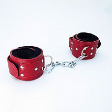Красные кожаные наручники с меховым подкладом 
Кожаные наручники красного цвета.