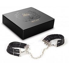 Чёрные дизайнерские наручники Plaisir Nacre Bijoux 
Потрясающее украшение, которое быстро возбудит вашего партнера! Представьте, что вы надели платье на обнаженное тело, и позволили мужчине надеть на себя эти наручники.