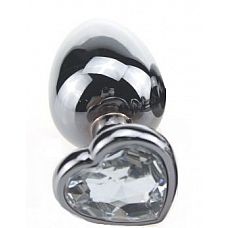 Серебристая пробка с прозрачным кристаллом-сердечком - 9 см. 
Металлическая анальная пробка с ограничительным основанием для безопасного использования и кристаллом.