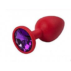 Красная анальная втулка с фиолетовым кристаллом - 7,3 см. 
Гладенькая силиконовая пробка с кристаллом в ограничительном основании. 