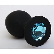 Чёрная анальная втулка с голубым кристаллом - 7,3 см. 
Гладенькая силиконовая пробка с кристаллом в ограничительном основании. 