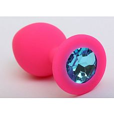 Розовая анальная втулка с голубым кристаллом - 7,3 см. 
Гладенькая силиконовая пробка с кристаллом в ограничительном основании. 