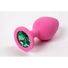 Розовая анальная втулка с зеленым кристаллом - 7,3 см. 
Гладенькая силиконовая пробка с кристаллом в ограничительном основании. 