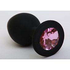 Чёрная анальная втулка с розовым кристаллом - 7,3 см. 
Гладенькая силиконовая пробка с кристаллом в ограничительном основании. 