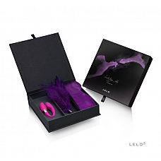 Подарочный набор Indulge Me Pleasure Set (LELO), Фиолетовый 
В набор входит: изящная повязка Intima Silk Blindfold, легкое перышко Tantra Feather Tease, массажер для пар Noa.